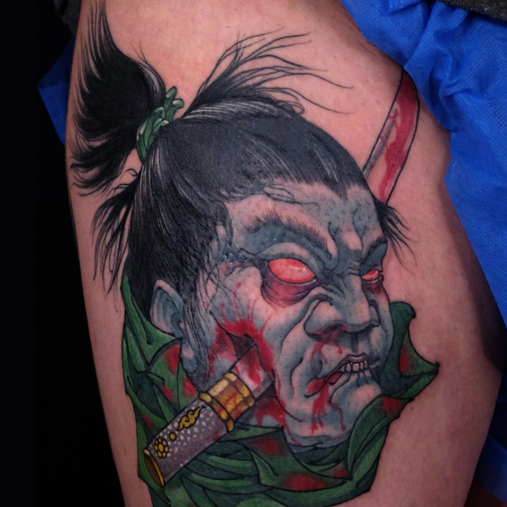 japanese-namakubi-severed-head-thigh-tattoo-singapore-ck-tattoo.png
